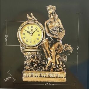 Elegant Gold Statue Clock